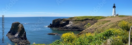 Valokuva Yaquina Head Lighthouse, a panoramic view, Oregon, USA, on a beautiful summer day