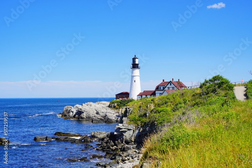 Atlantic ocean waves and rock beach along coastline in Portland, Maine, USA