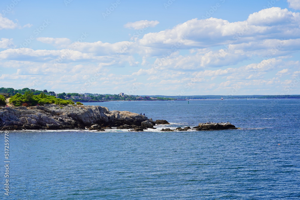 Atlantic ocean waves and rock beach along coastline in Portland, Maine, USA Atlantic ocean waves and rock beach along coastline in Portland, Maine, USA