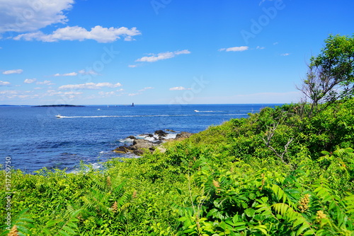 Atlantic ocean waves and rock beach along coastline in Portland, Maine, USA 