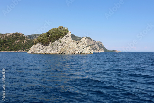 View to blue sea and rock islands on horizon. Deep water, background for traveling and vacation © Oleg
