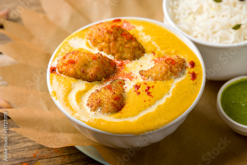 malai kofta with indian spices on bowl, indian cuisine macro close up photo