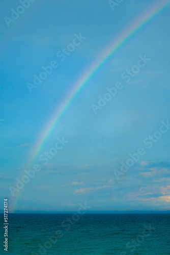 Calm blue seascape scenery with rainbow in the background in Pulau Besar  Mersing  Johor  Malaysia