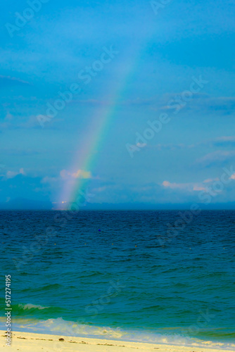 Calm blue seascape scenery with rainbow in the background in Pulau Besar  Mersing  Johor  Malaysia
