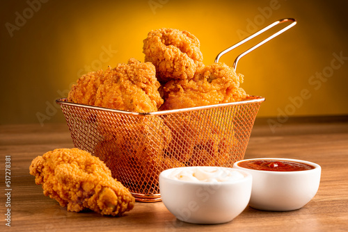 Crispy fried chicken in the basket.