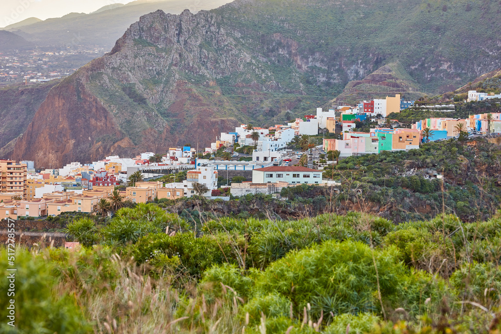 Colorful buildings in Santa Cruz, La Palma, Canary Islands with copy space. Beautiful cityscape with bright colors and mountains. A vibrant holiday, vacation and getaway destination on the hillside