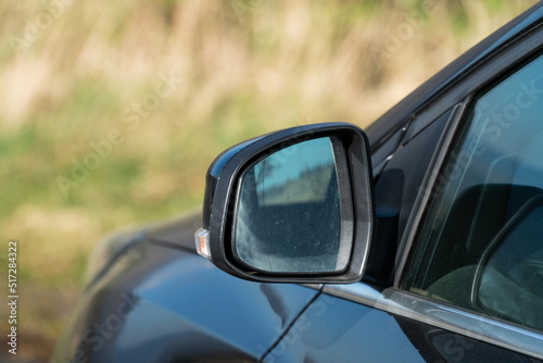side rear-view mirror on a car © Pawel Pajor