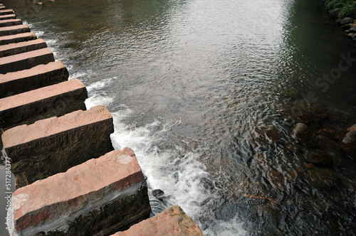 water flowing into the river