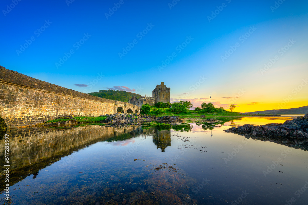 Eilean Donan Castle at sunset in Scotland