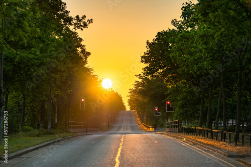 Fotografering Empty road at sunrise