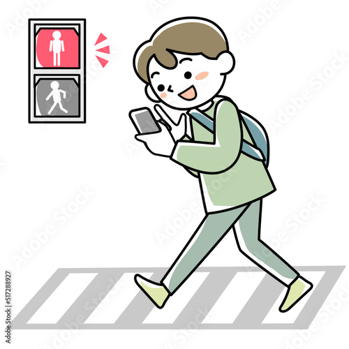 歩きスマホをしていて赤信号に気づかない若者