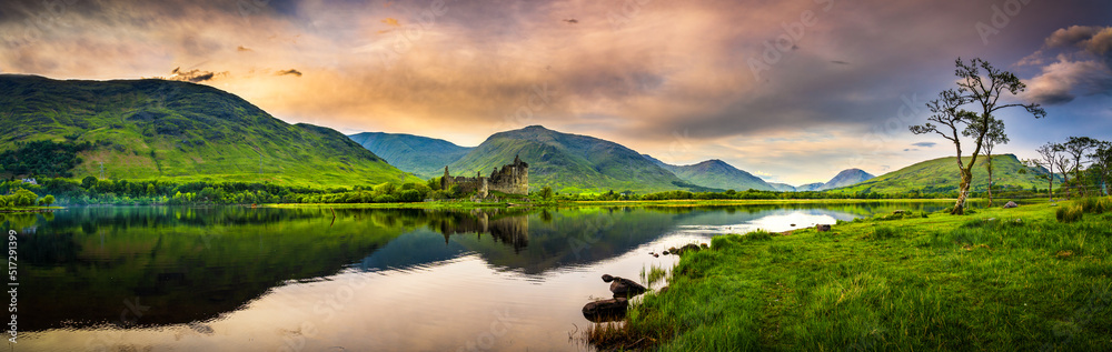 The ruins of Kilchurn castle at sunset on Loch Awe, the longest fresh water loch in Scotland The ruins of Kilchurn castle at sunset on Loch Awe, the longest fresh water loch in Scotland