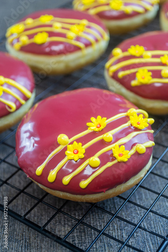 red velvet donuts or donat red velvet, the taste is sweet and savory combined with red velvet glaze that melts in the mouth