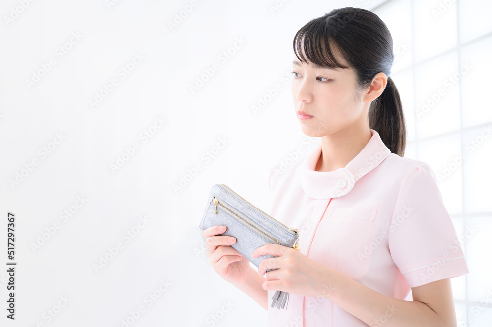 Image of a nurse with no money Pink Copy Space Image of a nurse with no money Pink Copy Space