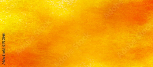 Blurry and fluffy orange or yellow background with smoke, bright and shinny yellow or orange watercolor shades grunge background with space, yellow or orange background for any design and wallpaper. 
