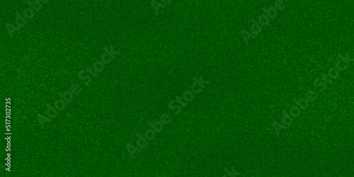 Grainy and searched green brush painted grunge texture, painted green background with grunge texture for wallpaper, cover, card, invitation, decoration, construction and design. 