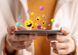 Psychology Personality Concept. Extrovert Person. Happiness and Enjoyment Emoticon while Using Mobile Phone. Close-up shot