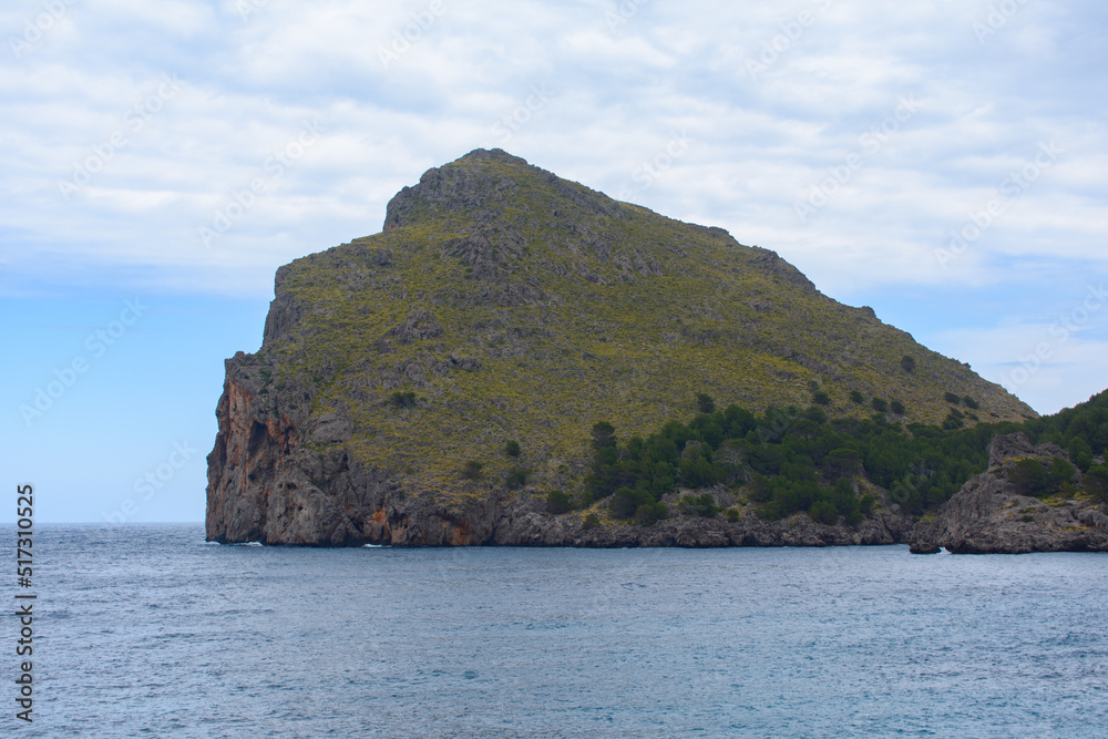 Cliffs and turquoise sea water at coast in Sa Calobra, Mallorca, Spain