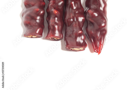 National caucasian dessert churchkhela isolated on a white background. photo