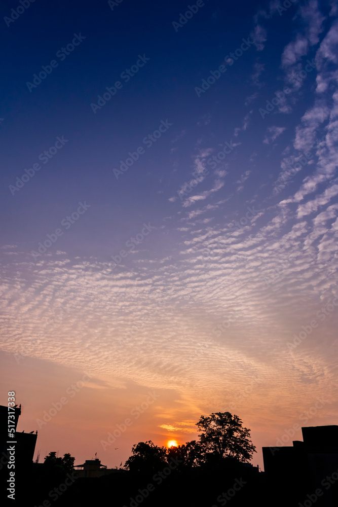 Fototapeta premium Amazing cloud formation in colourful sky during a monsoon sunrise morning