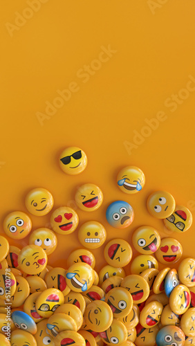 Vertical shot of a bunch of emojis with faces representing different emotions. 3d rendering. photo