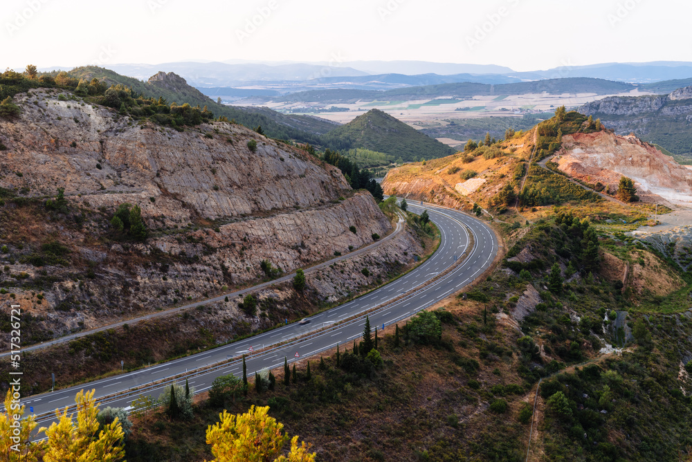 Aerial view of highway through mountains in Rioja Region of Spain