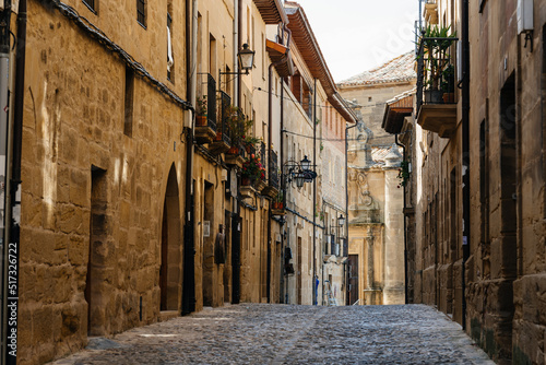 Cobblestoned street in the medieval town of Briones, Rioja, Spain. Picturesque And Narrow Streets On A Sunny Day. Architecture, Art, History, Travel photo