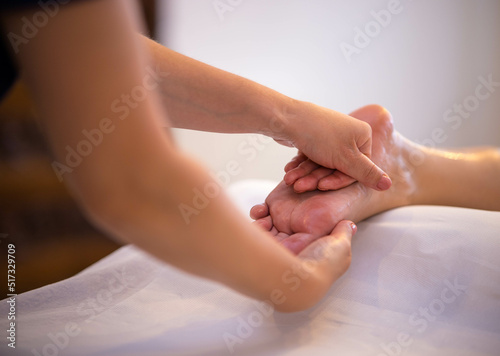 A girl receives a therapeutic and relaxing massage