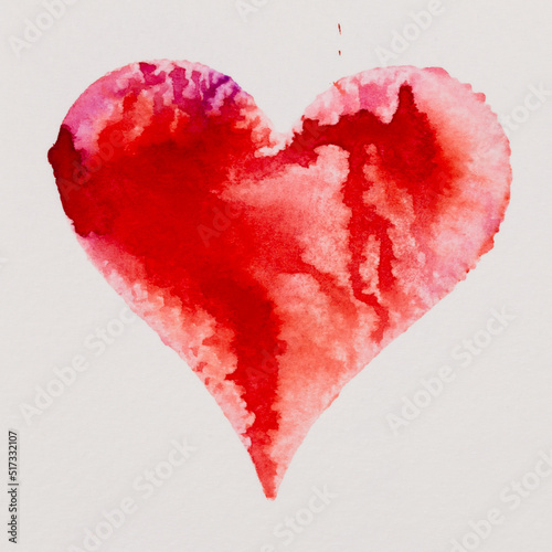 Watercolor painted pink heart, on the white watercolor paper.
