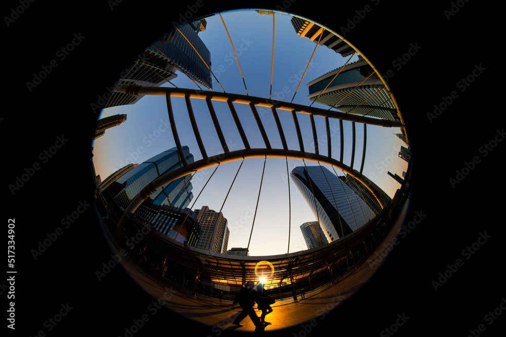 Special fisheye view, circle image of Chong Nonsi interchange MRT station with BRT in the evening, Bangkok, Thailand.