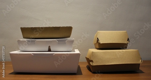 Disposable paper food packaging for take out orders.