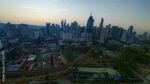 Timelapse 4k UHD footage of cityscape of Kuala Lumpur during sunrise photo