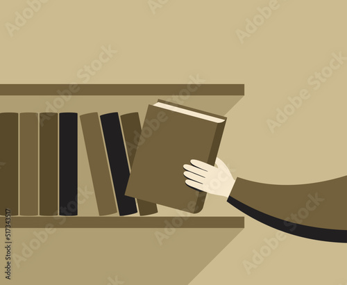 Hand taking the book - self-studying motivation