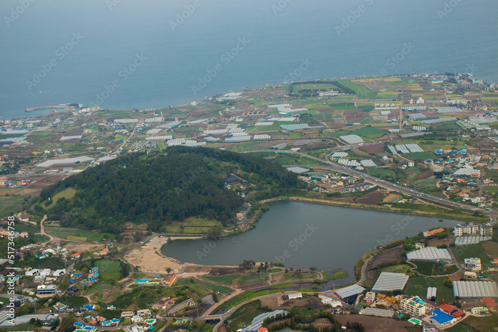 Aerial view of Jeju city from the plane window.