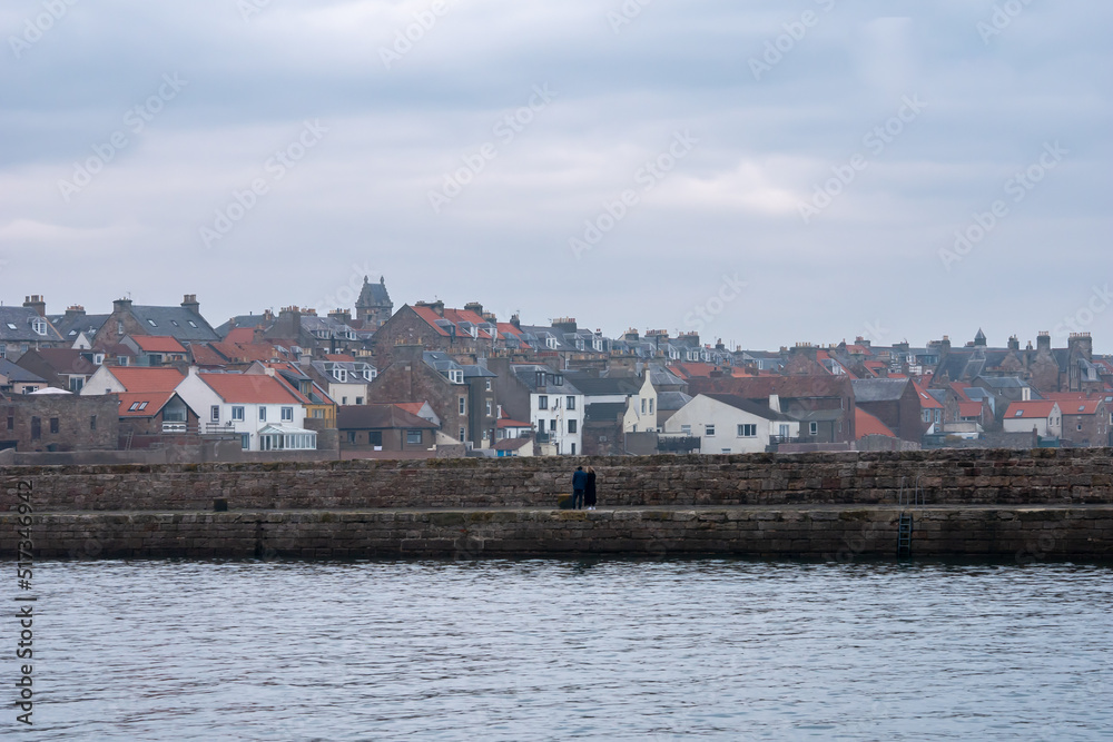 Cityscape of Anstruther coastal fishing town in Scotland on a cloudy day