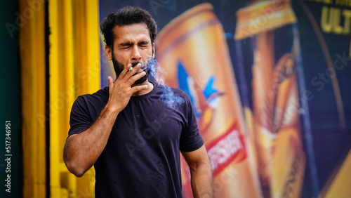 man smoking in market outdoor © FireFXStudio