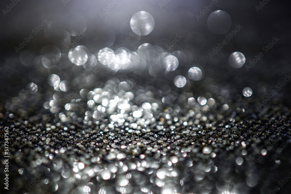 Fototapeta premium Background of abstract glitter lights. Gold, silver and black bokeh banner.