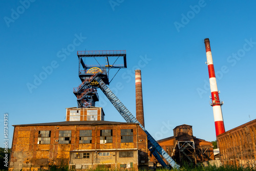Distant view for the shaft tower of a closed black coal mine. Decarbonization processes in the modern world during the energy crisis