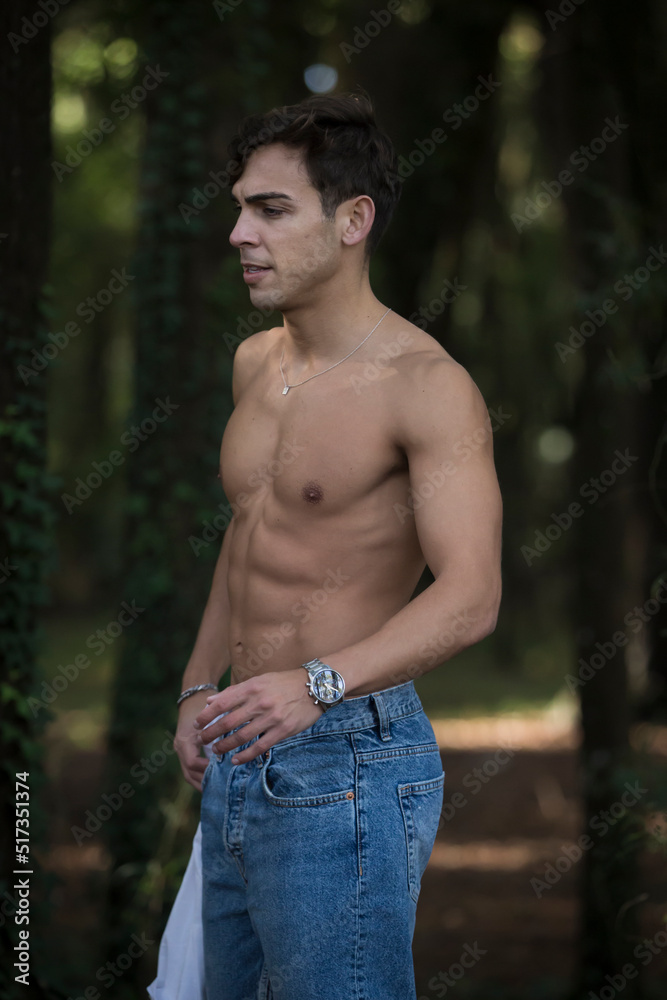 Young dark-skinned man on display for workshop for young models. Young dark-skinned man on display for workshop for young models.