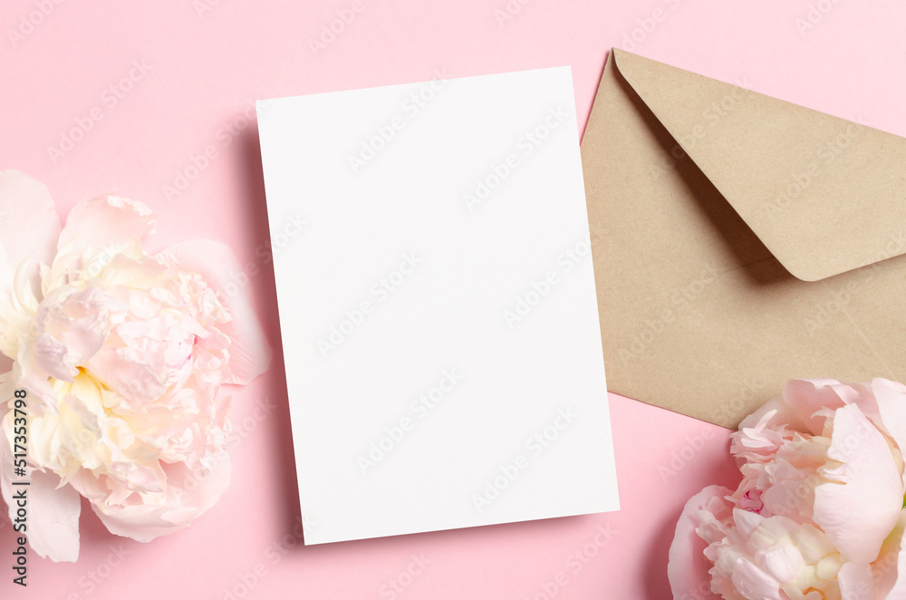 Blank greeting or invitation card mockup with envelope and pink peony flowers Blank greeting or invitation card mockup with envelope and pink peony flowers