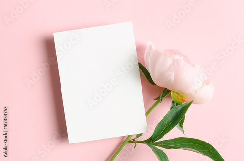 Blank greeting card mockup with pink peony flowers