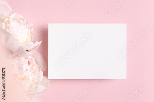 Wedding invitation card mockup with pink flowers © nikavera