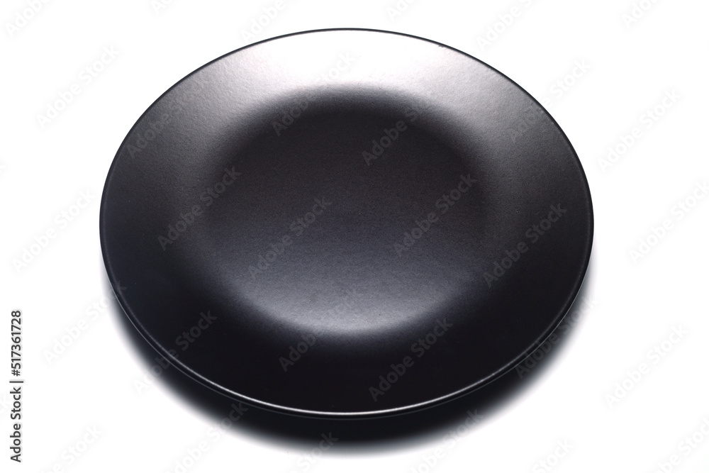 Empty black slate plate on white background. Food background for menu, recipe. Table setting. Flatlay, top view. Mockup for restaurant dish Empty black slate plate on white background. Food background for menu, recipe. Table setting. Flatlay, top view. Mockup for restaurant dish
