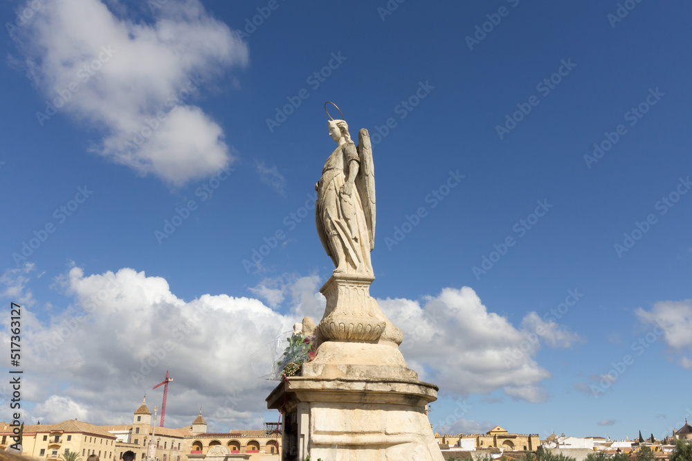 Statue of Saint Raphael in the middle of the Roman Bridge, Puente Romano in Cordoba, Spain.