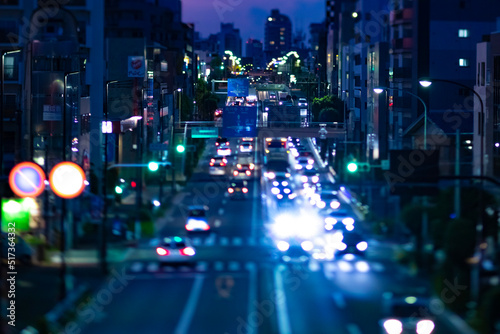 A miniature traffic jam at the street in Setagaya Tokyo at dusk.