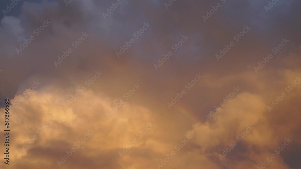 Sunset yellow storm clouds moving slowly in the sky. Sunset yellow storm clouds moving slowly in the sky.