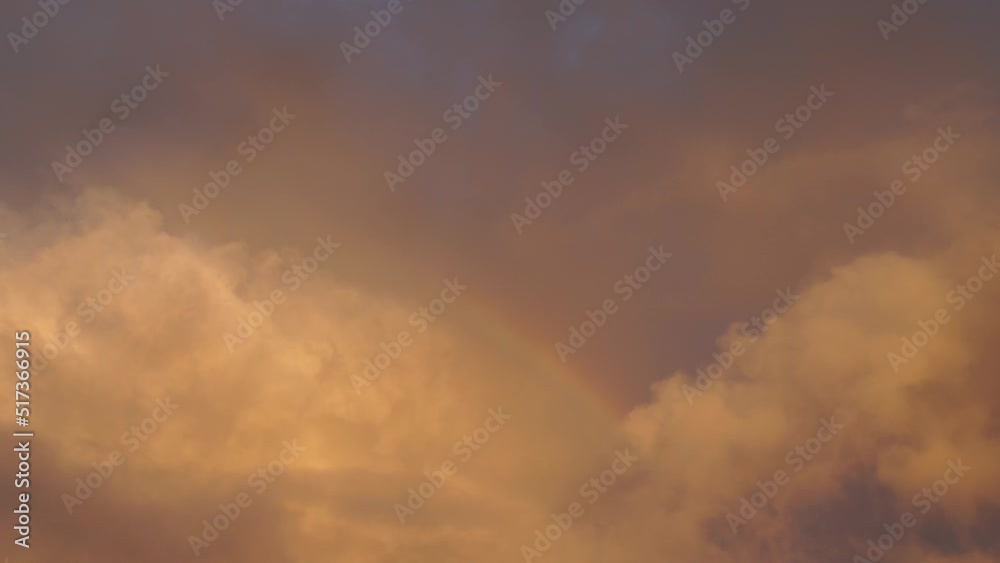 Sunset yellow storm clouds moving slowly in the sky. Sunset yellow storm clouds moving slowly in the sky.