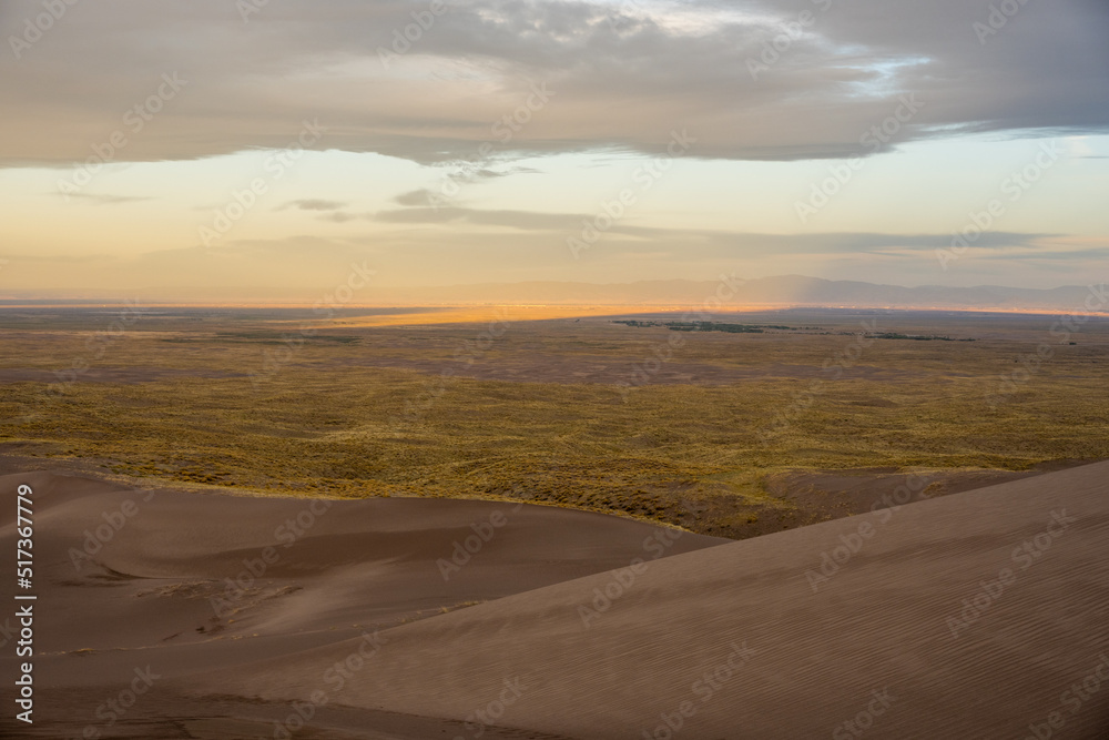 Morning Light Over Valley Below Dunes