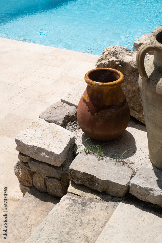 Naklejka premium ceramic pot by the pool