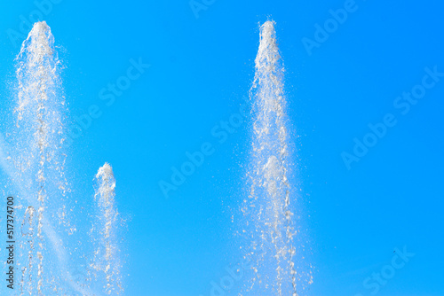 fountain jets in the blue sky